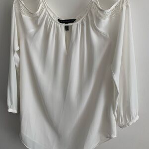 White House Black Market cream colored cold shoulder blouse